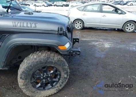 2021 Jeep Wrangler Unlimited Willys Sport 4X4 z USA, uszkodzony, nr VIN 1C4HJXDN4MW718488